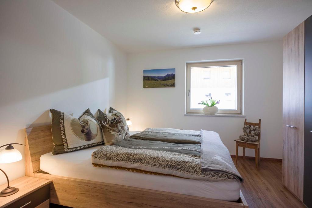 Postel nebo postele na pokoji v ubytování Ledermaier Loft & Lodge`s eU