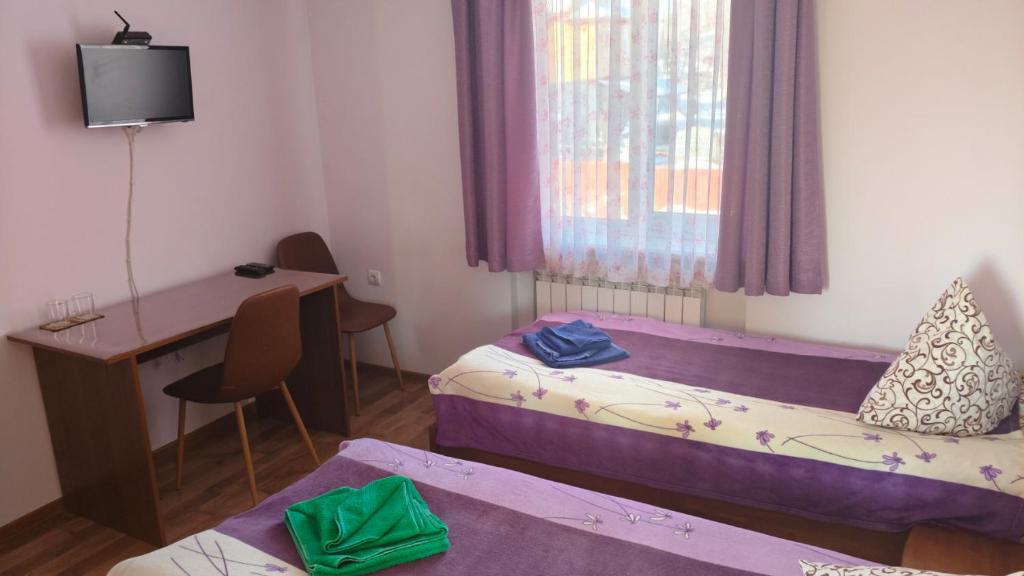 Postel nebo postele na pokoji v ubytování Anastasia