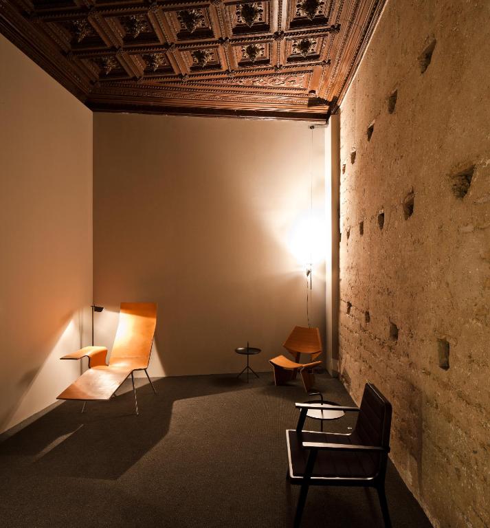 Posezení v ubytování Caro Hotel
