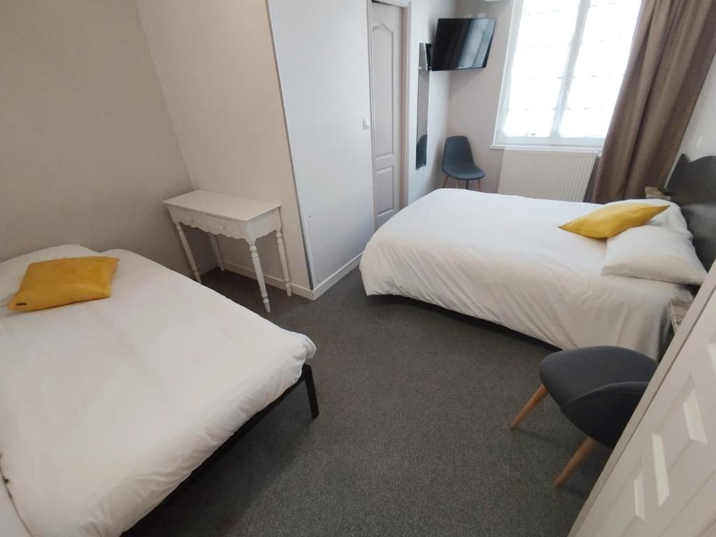 Postel nebo postele na pokoji v ubytování Les Cascades - Hôtel de Charme