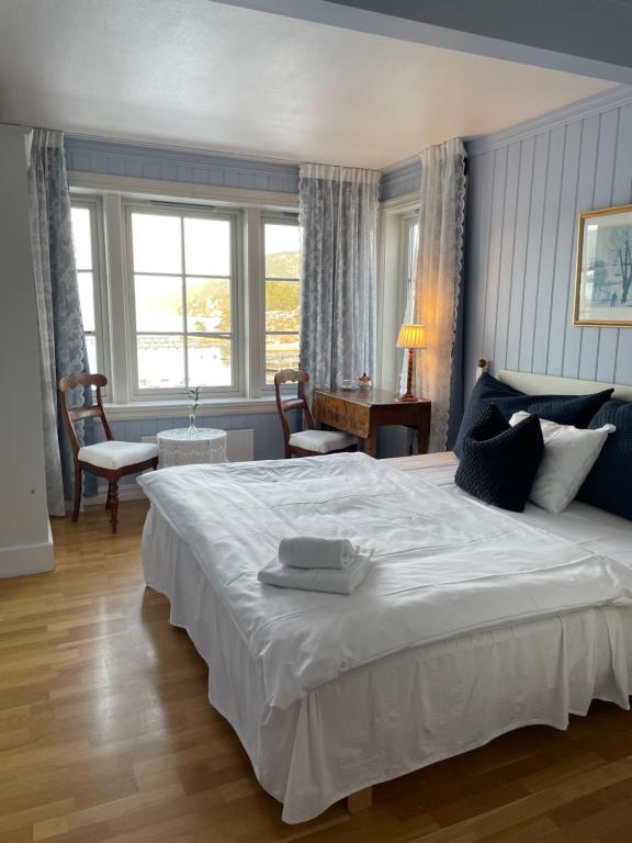 Postel nebo postele na pokoji v ubytování Badehotellet