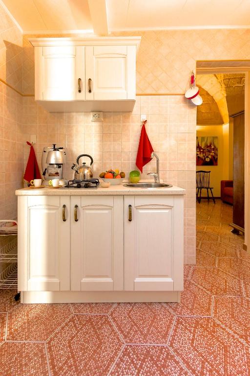 Kuchyň nebo kuchyňský kout v ubytování B&B Corte Dei Musco