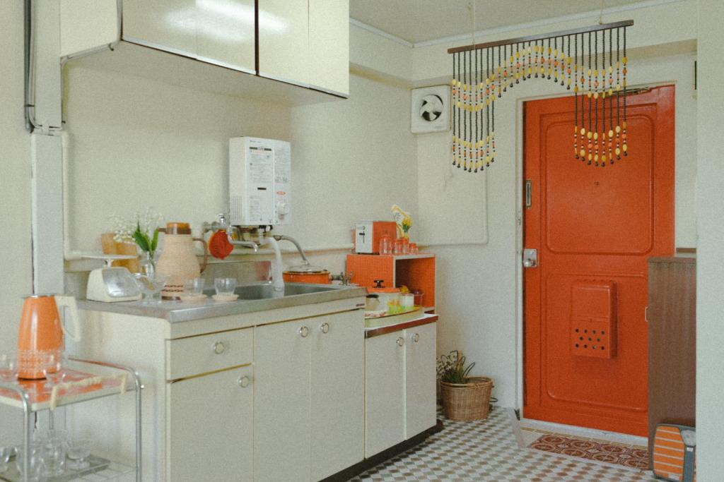 Kuchyň nebo kuchyňský kout v ubytování Showa Retro