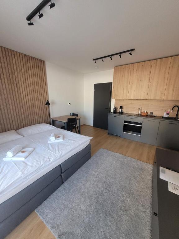 Postel nebo postele na pokoji v ubytování Apartmány Florián
