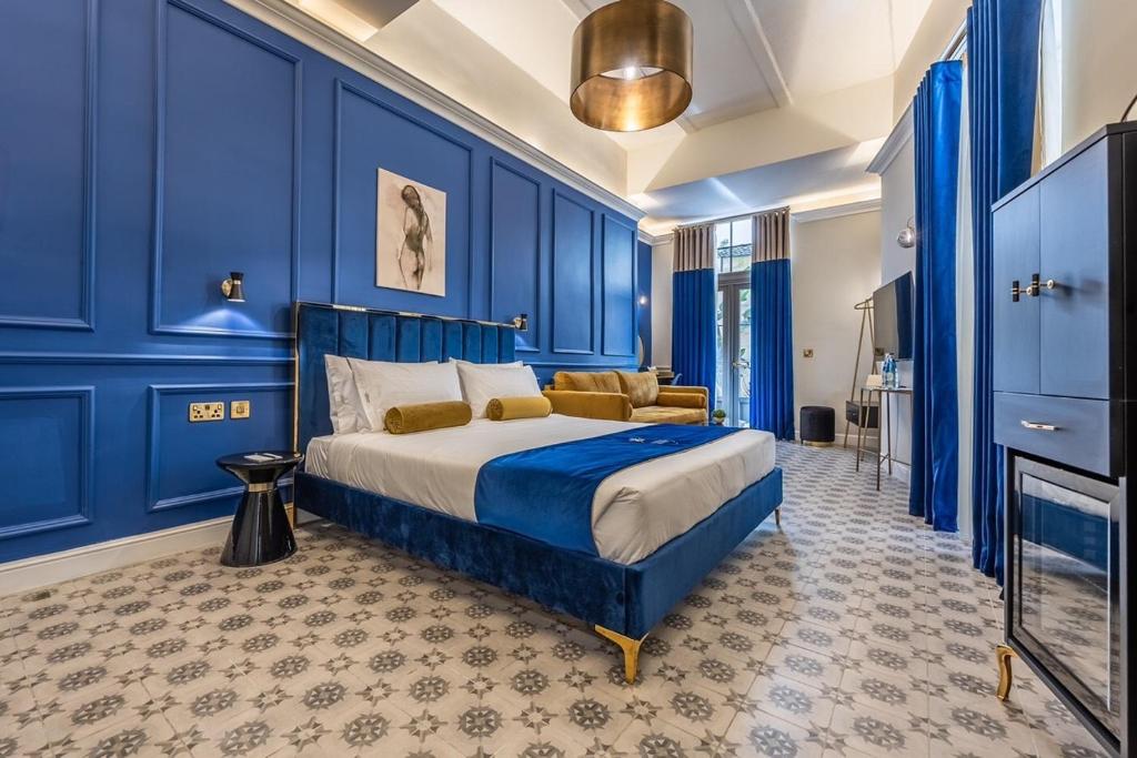 Postel nebo postele na pokoji v ubytování Maison Medina Malta