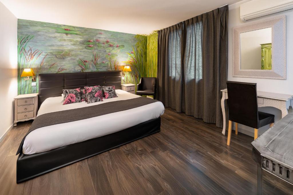 Postel nebo postele na pokoji v ubytování HOTEL ERMITAGE