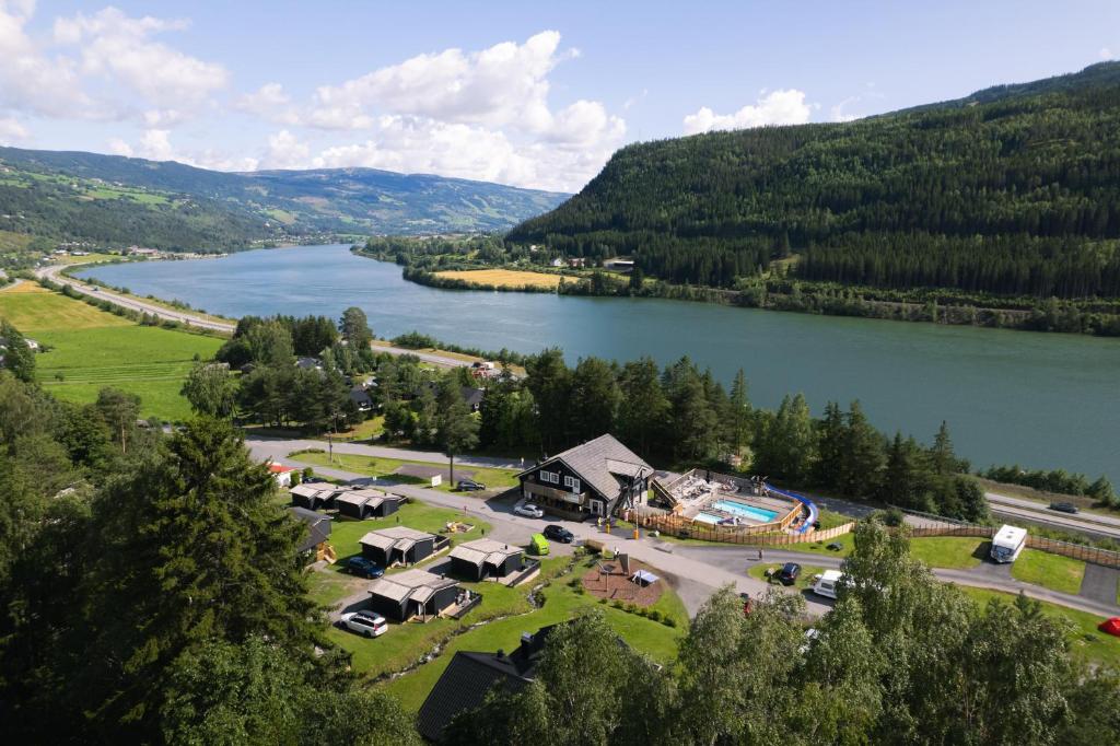 an aerial view of a resort next to a lake at Topcamp Rustberg - Hafjell in Hafjell