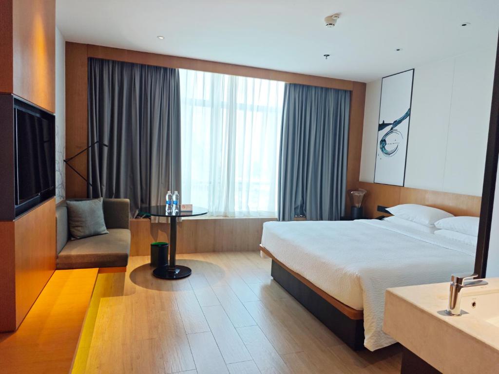 Postel nebo postele na pokoji v ubytování Fairfield by Marriott Foshan Nanhai