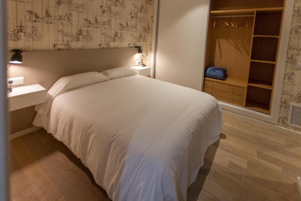 Postel nebo postele na pokoji v ubytování Host & Home