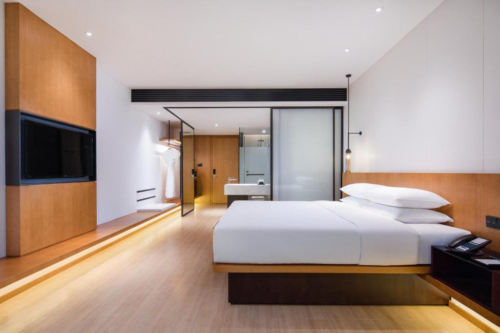 Postel nebo postele na pokoji v ubytování Fairfield by Marriott Foshan Nanhai