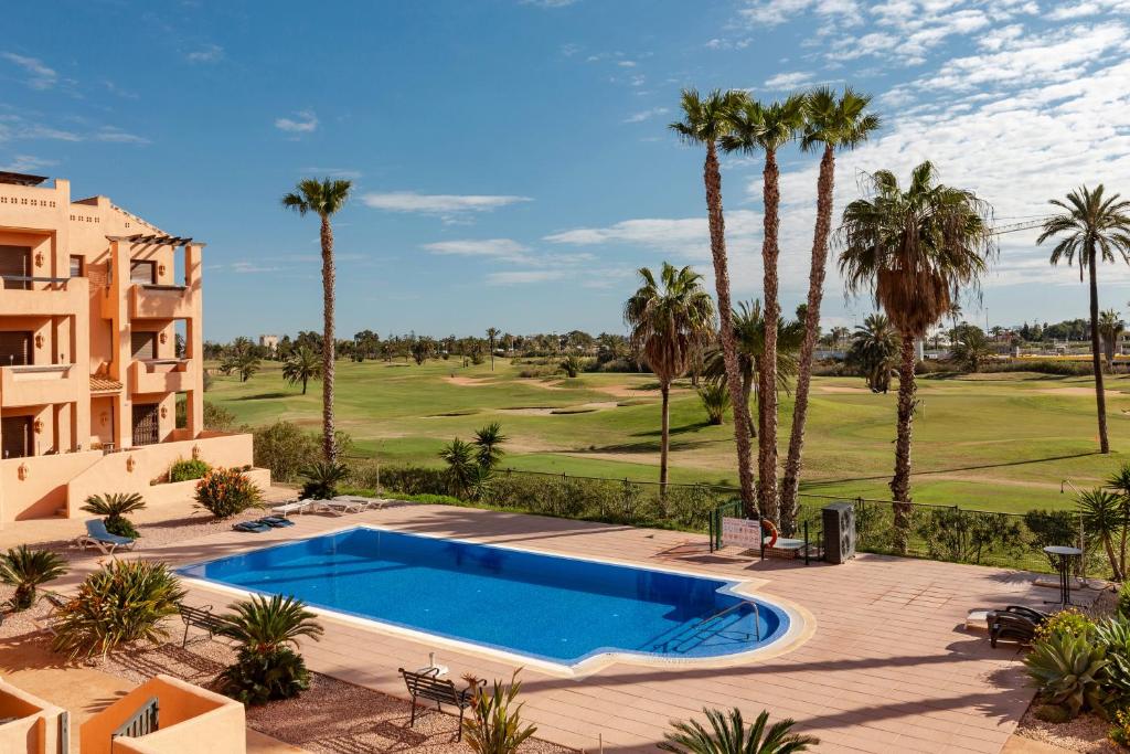 Πισίνα στο ή κοντά στο Golf And Sun