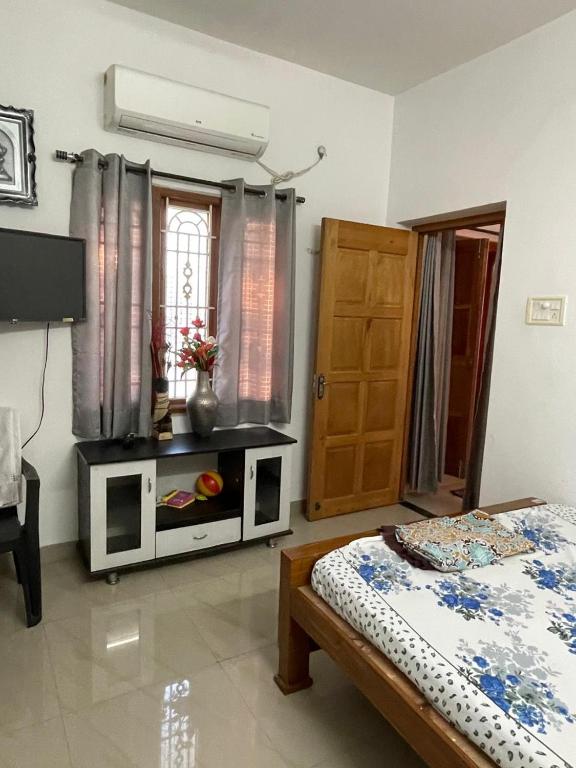 Postel nebo postele na pokoji v ubytování Bliss-family Homestay