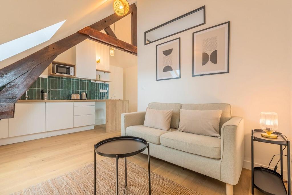 Kuchyň nebo kuchyňský kout v ubytování Appartement une chambre atypique