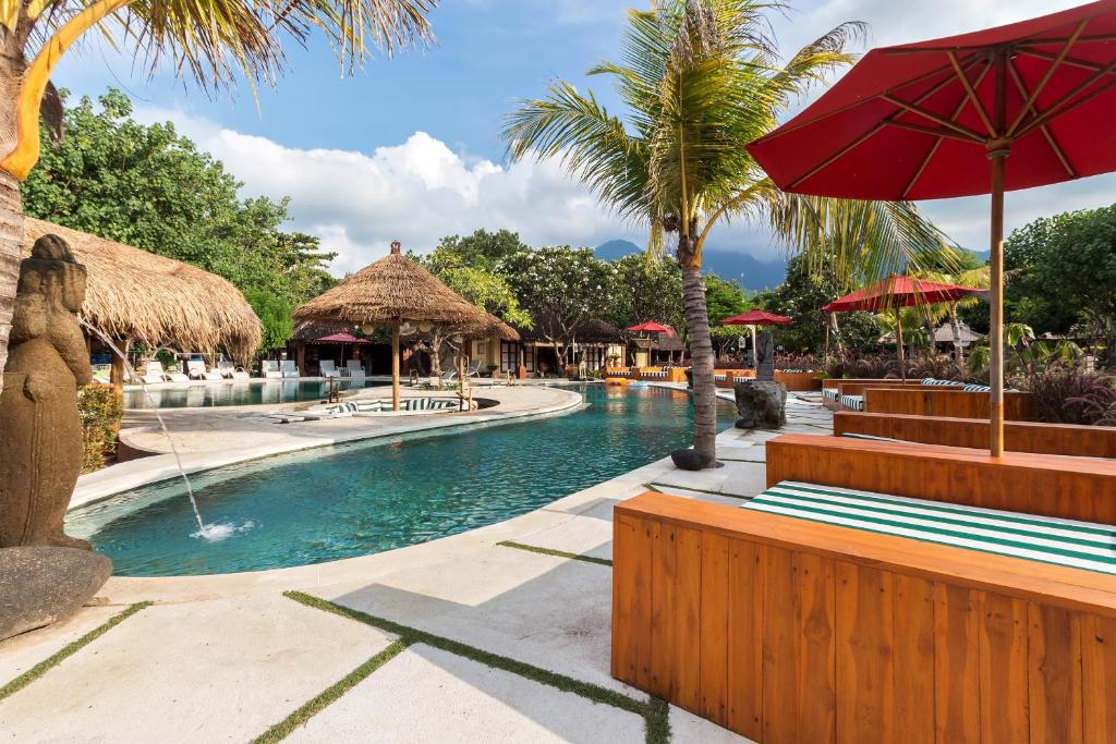 Bazén v ubytování Taman Sari Bali Resort and Spa nebo v jeho okolí