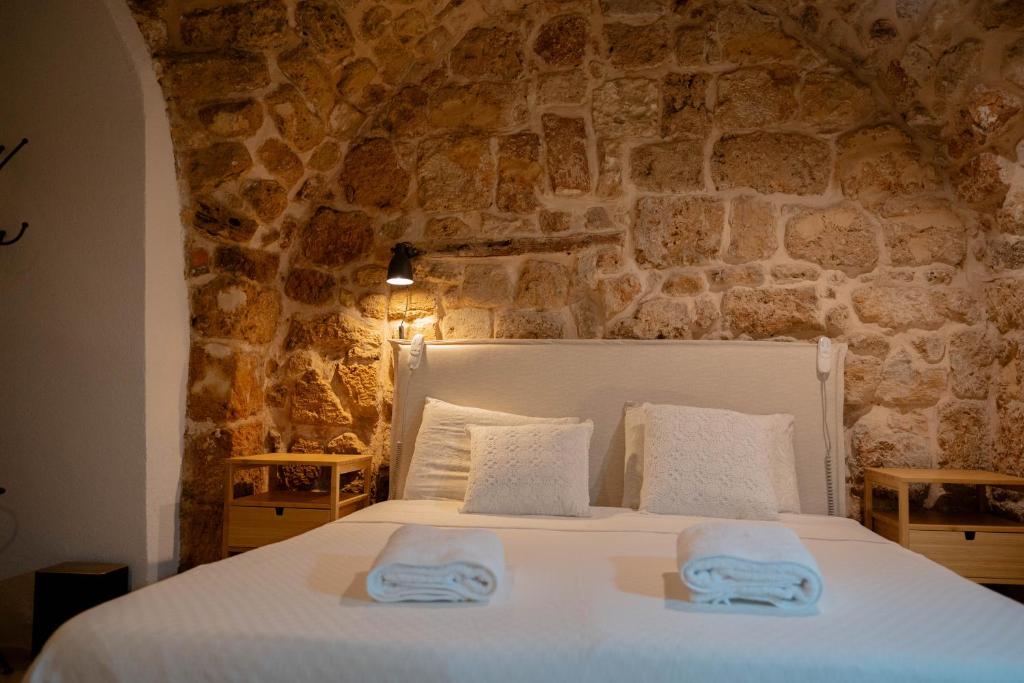 Postel nebo postele na pokoji v ubytování Nov Antique - AKKO
