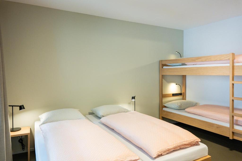 Voodi või voodid majutusasutuse Martigny Youth Hostel toas