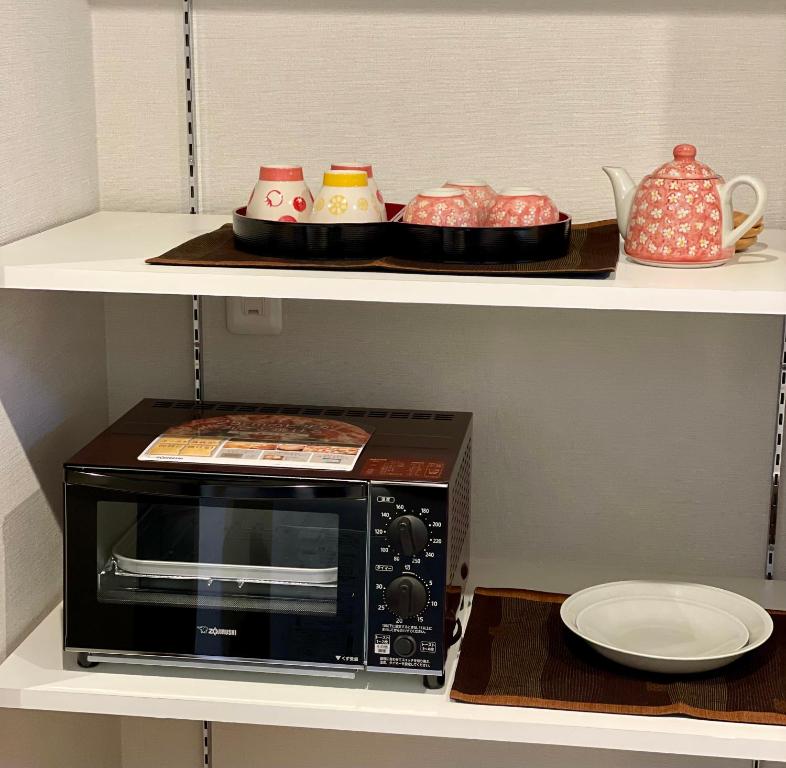 Kuchyň nebo kuchyňský kout v ubytování Yukari Kyoto