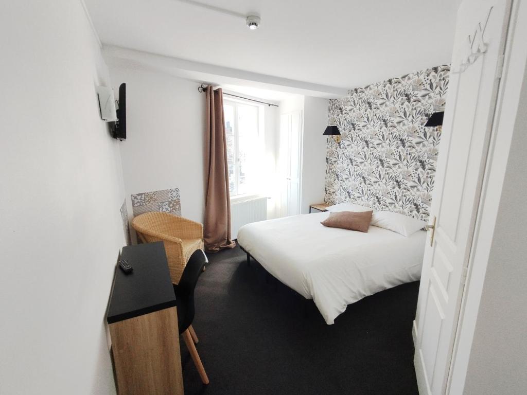 Postel nebo postele na pokoji v ubytování Les Cascades - Hôtel de Charme