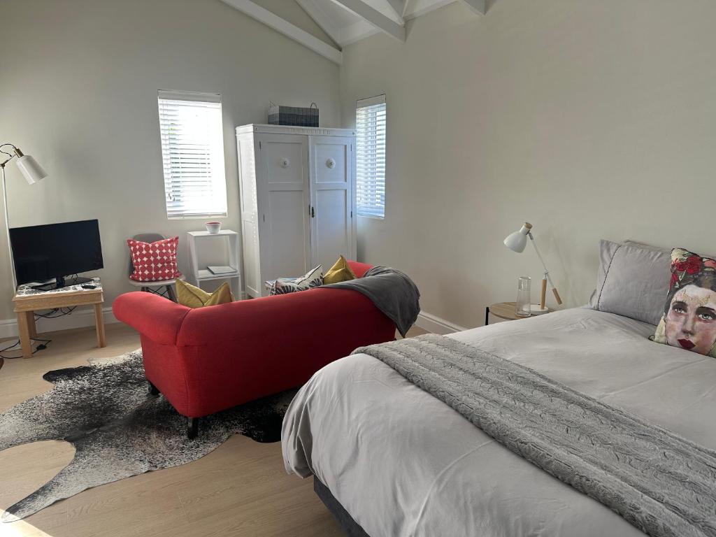 Кровать или кровати в номере Island Studio Apartment