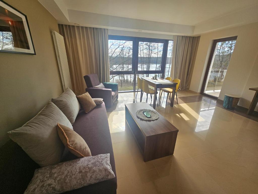 Posedenie v ubytovaní Apartament Perła A20 nad jeziorem Pluszne