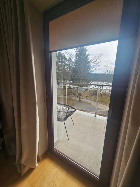 Balkón alebo terasa v ubytovaní Apartament Perła A20 nad jeziorem Pluszne