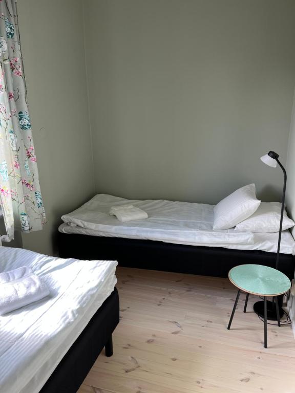 Postel nebo postele na pokoji v ubytování Svanbergs gästrum B&B