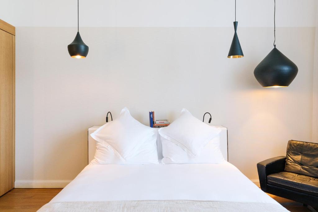 Letto o letti in una camera di B2 Hotel Zürich