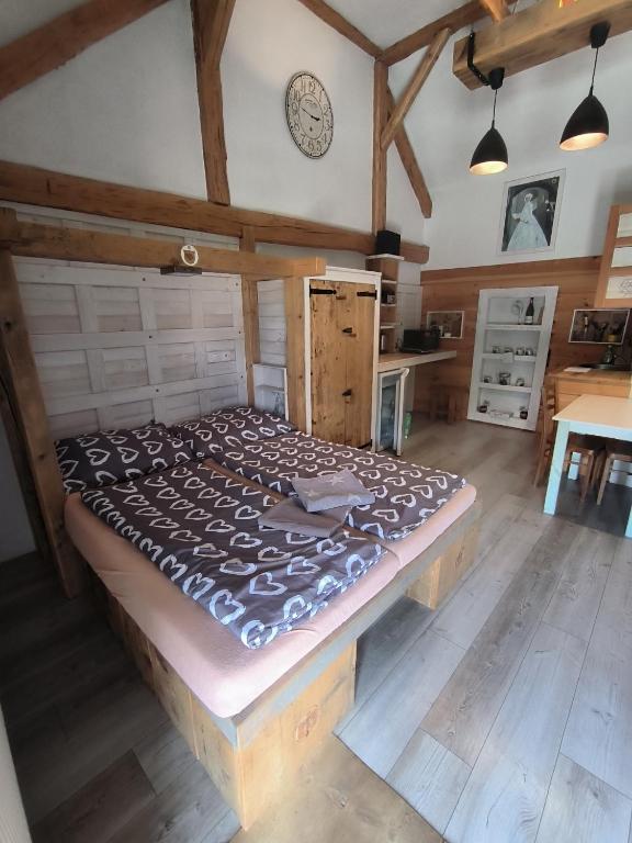 Postel nebo postele na pokoji v ubytování Pokojíky na Větrné