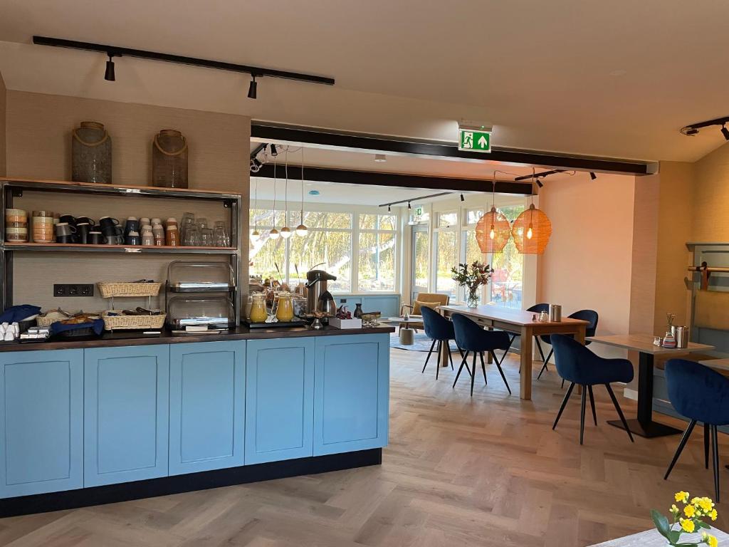 Kuchyň nebo kuchyňský kout v ubytování DuinHotel Texel