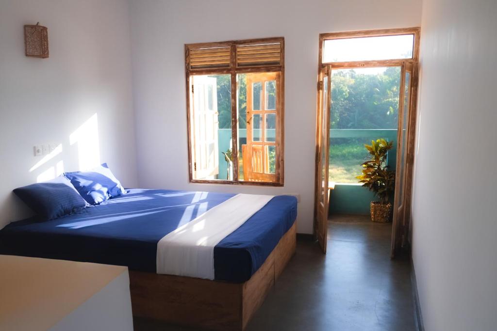 Postel nebo postele na pokoji v ubytování Ceylon's House