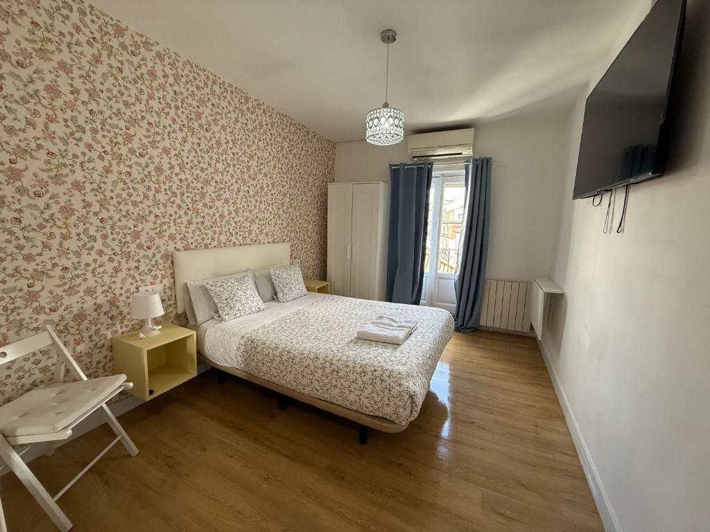 Cama o camas de una habitación en Hostal Flat55Madrid