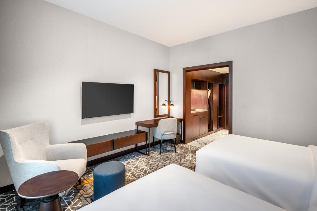 Postel nebo postele na pokoji v ubytování Four Points by Sheraton Jeddah King Fahd Road
