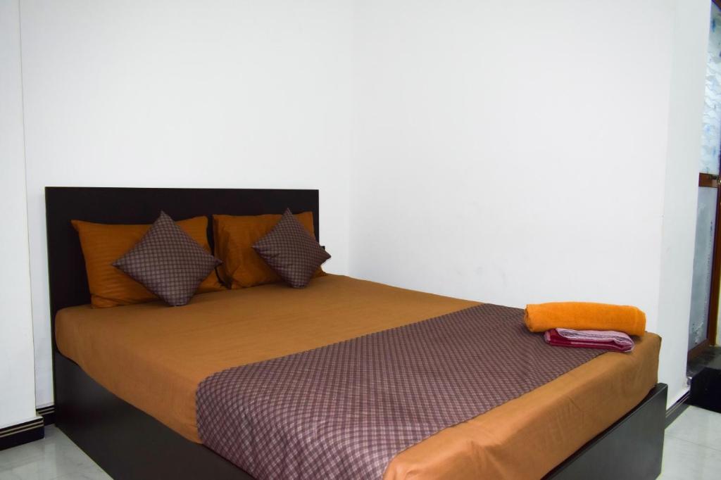 Postel nebo postele na pokoji v ubytování SSS HOTEL