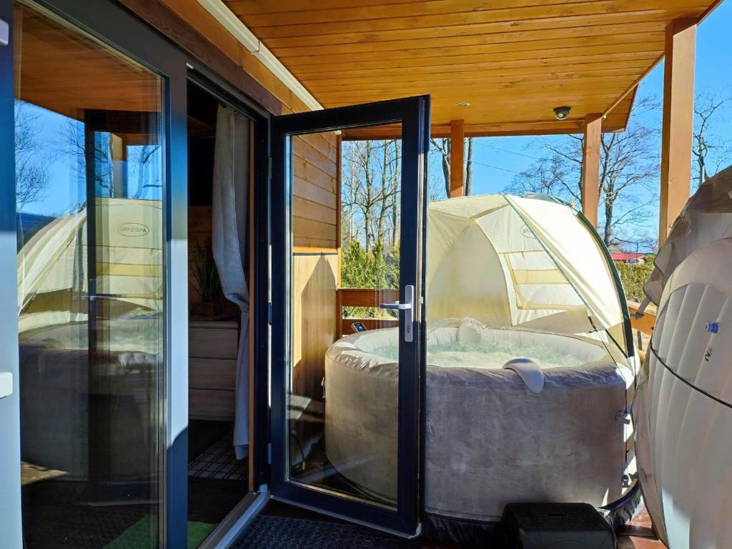 Posteľ alebo postele v izbe v ubytovaní Osada Widok na Góry - Dwa domki z Jacuzzi na wyłączność