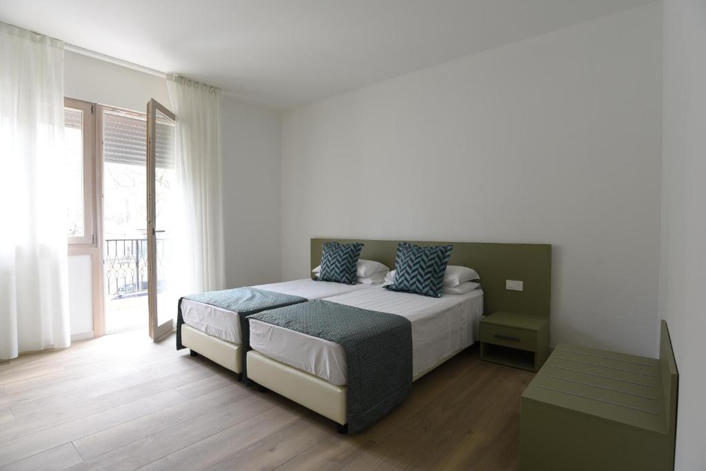 Postel nebo postele na pokoji v ubytování Bed and Breakfast Alla Posta