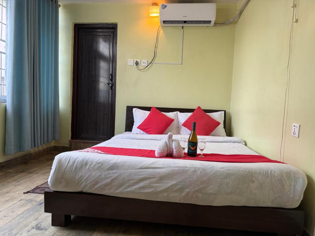 Postel nebo postele na pokoji v ubytování Hotel Arhant Inn