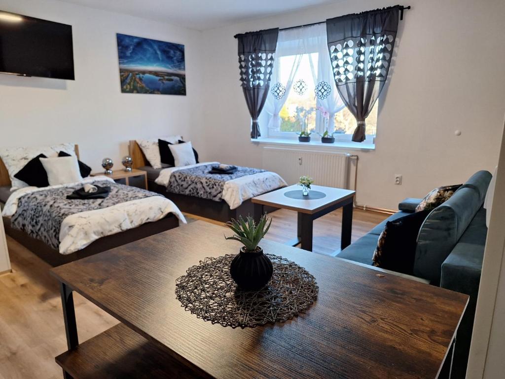 Postel nebo postele na pokoji v ubytování Apartmá Vrbice