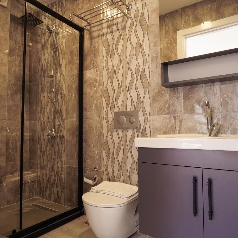 Koupelna v ubytování Ararat Hotel