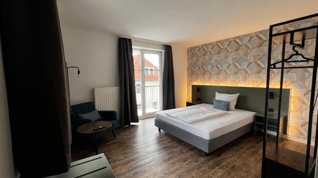 Postel nebo postele na pokoji v ubytování Hotel Siebeneichen