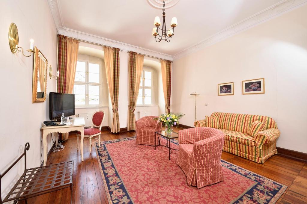 TV a/nebo společenská místnost v ubytování Hotel Graf von Mansfeld