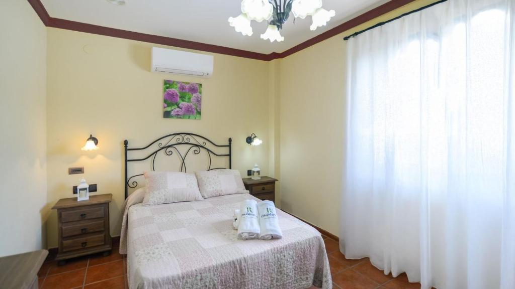 Posteľ alebo postele v izbe v ubytovaní Las Palomas II Nerja by Ruralidays