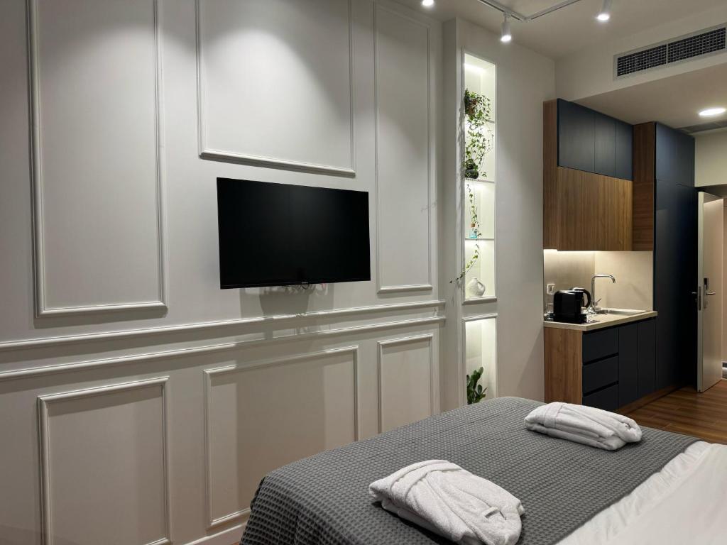 Postel nebo postele na pokoji v ubytování Moonlight Apartments Tirana