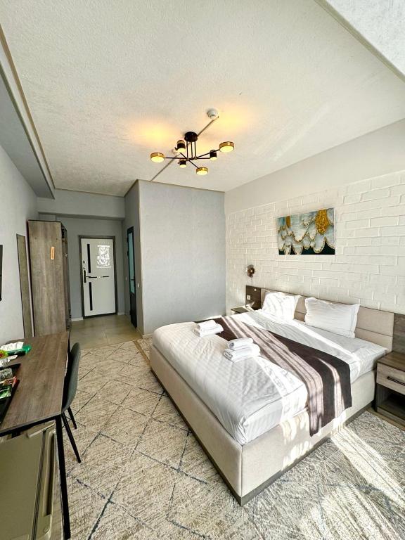 Ліжко або ліжка в номері Beshchinor Hotel