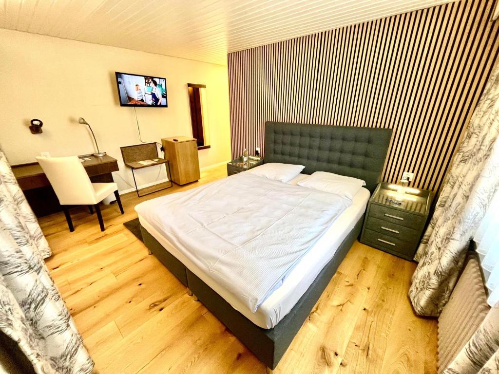 Postel nebo postele na pokoji v ubytování Seiler's Hotel