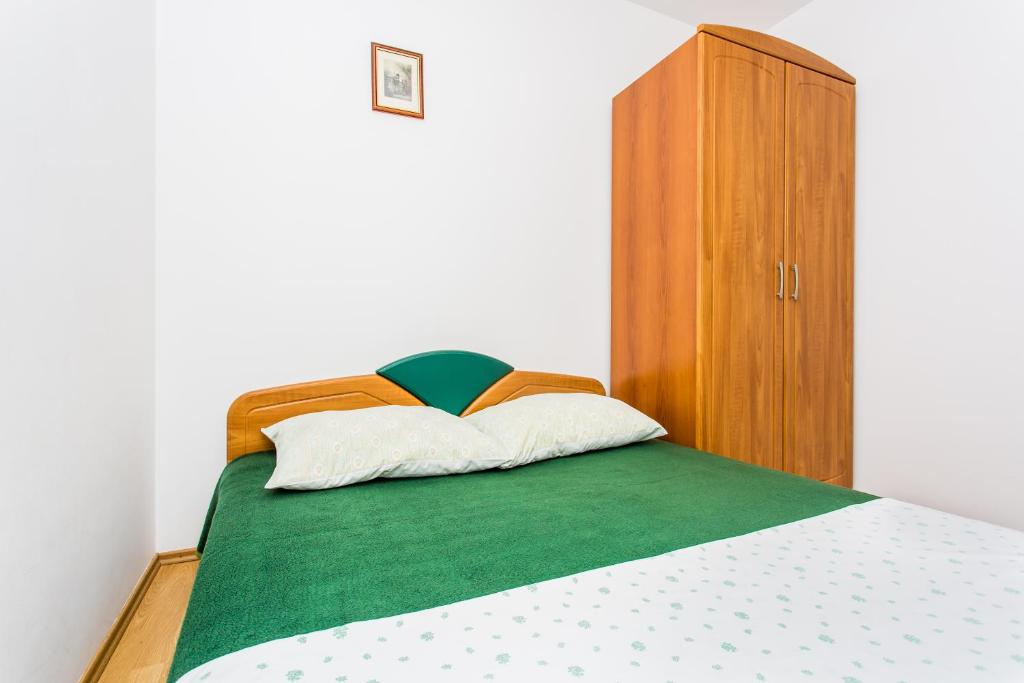 Posteľ alebo postele v izbe v ubytovaní Guest house Lavanda 2