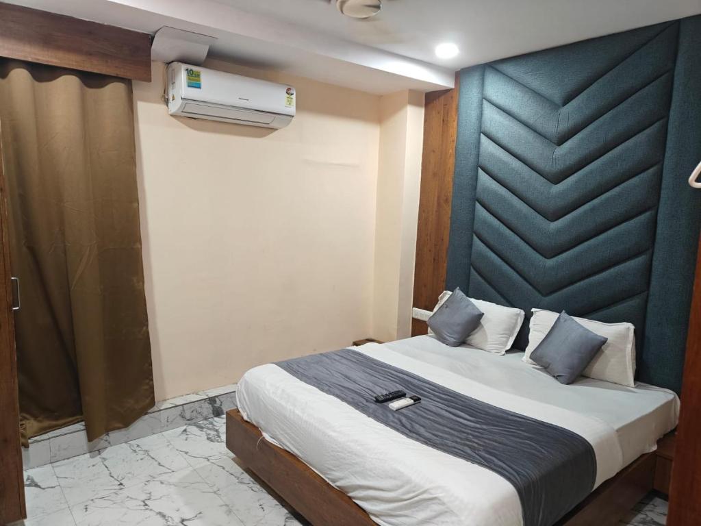 Postel nebo postele na pokoji v ubytování Hotel Royal King