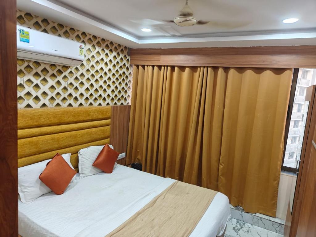 Postel nebo postele na pokoji v ubytování Hotel Royal King