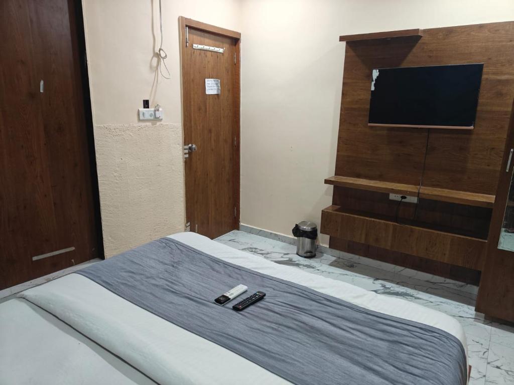 Postel nebo postele na pokoji v ubytování Hotel Royal King