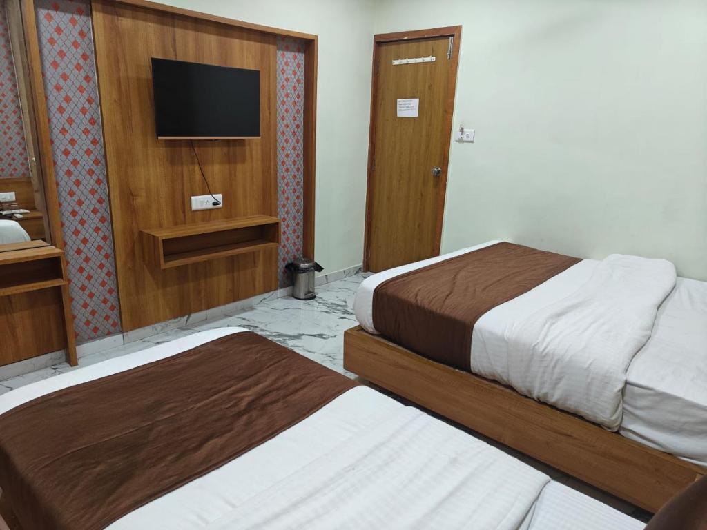 Postel nebo postele na pokoji v ubytování Hotel Royal King