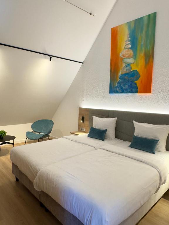 Postel nebo postele na pokoji v ubytování Living & Serviced Apartments by Blauer Wolf